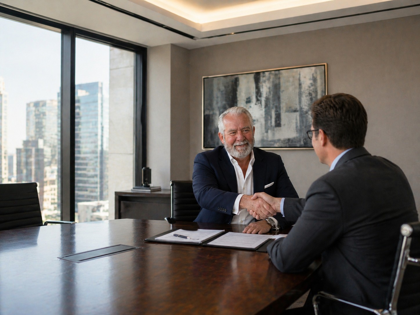 George Stinson closing a deal with a client